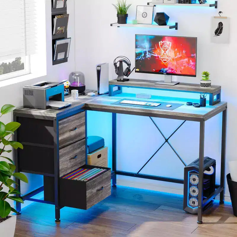 Scrivania angolare a L (120 cm) con luci LED, prese di corrente, porte USB e 3 cassetti