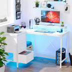 Scrivania angolare a L (120 cm) con luci LED, prese di corrente, porte USB e 3 cassetti