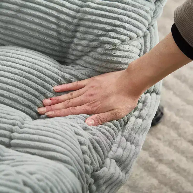 Poltrona relax con pouf e tasca laterale