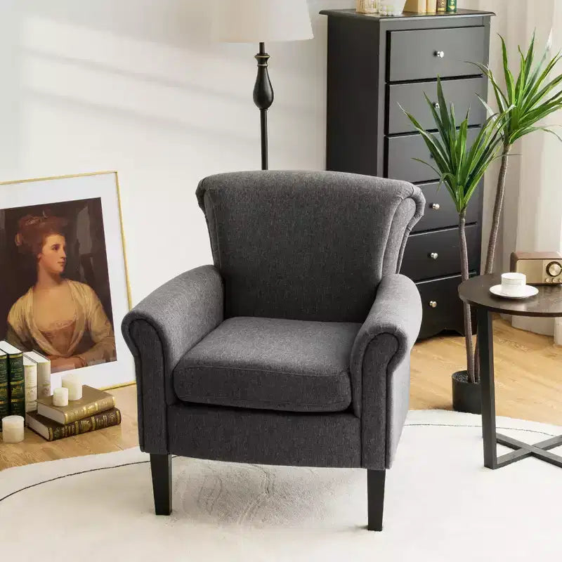 Sedia d'accento in tessuto imbottito con gambe in legno di caucciù